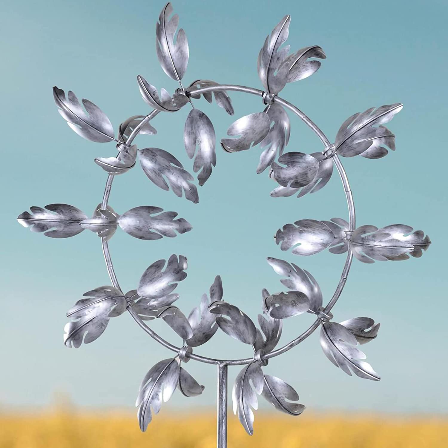 Molino de viento mágico de metal: Escultura de viento cinética para el jardín