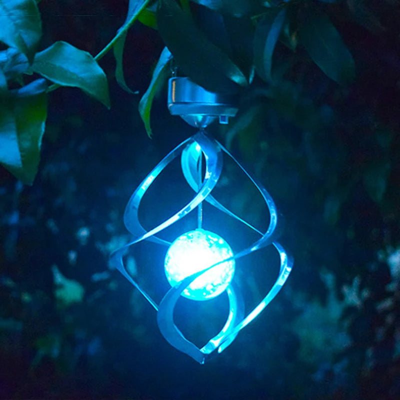 Lámpara LED giratoria solar con campana de viento